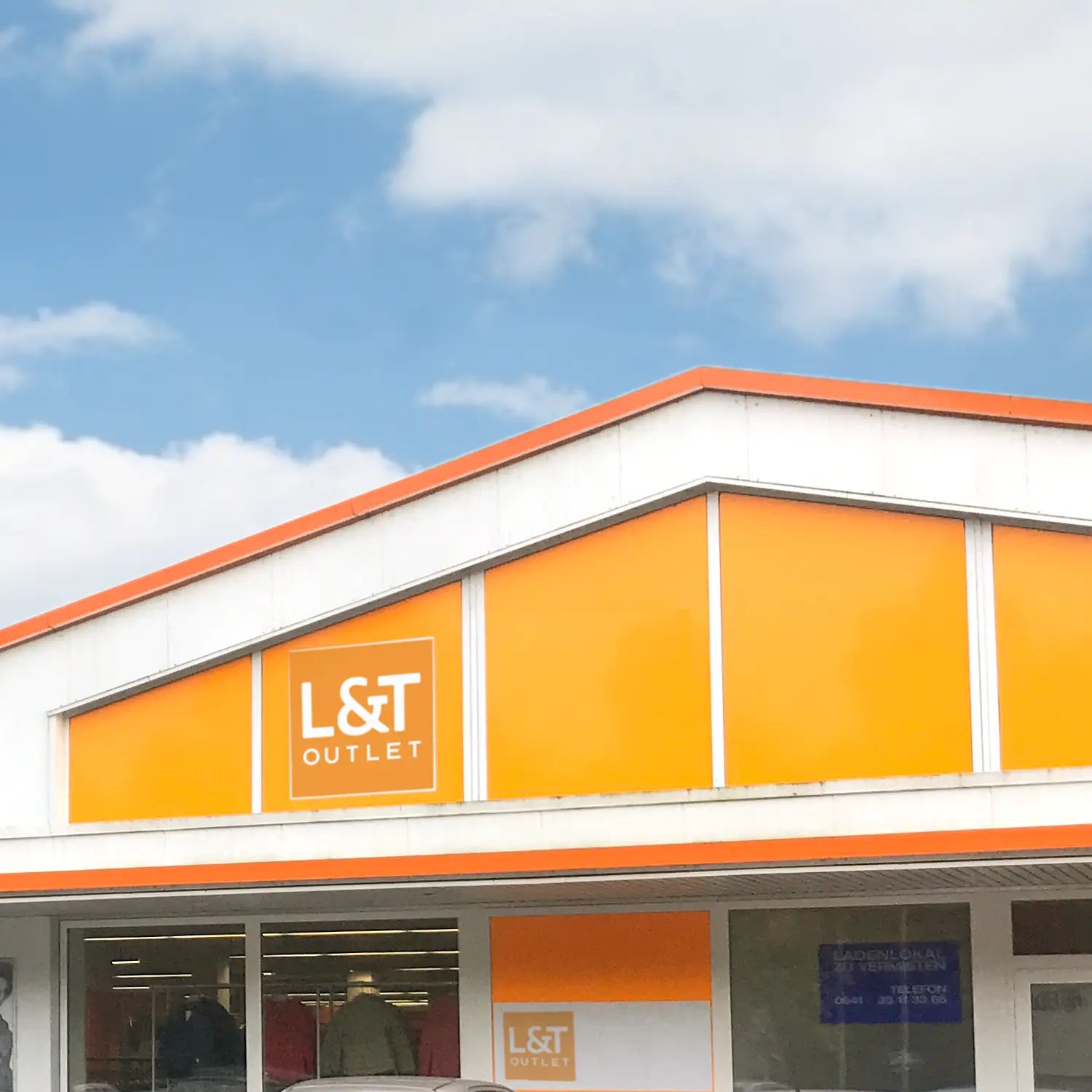 2017_11_fassade_outlet_neues_logo.webp